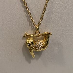 New, no tags, gold chain necklace, 20 inches, tiny sloth charm with bling
